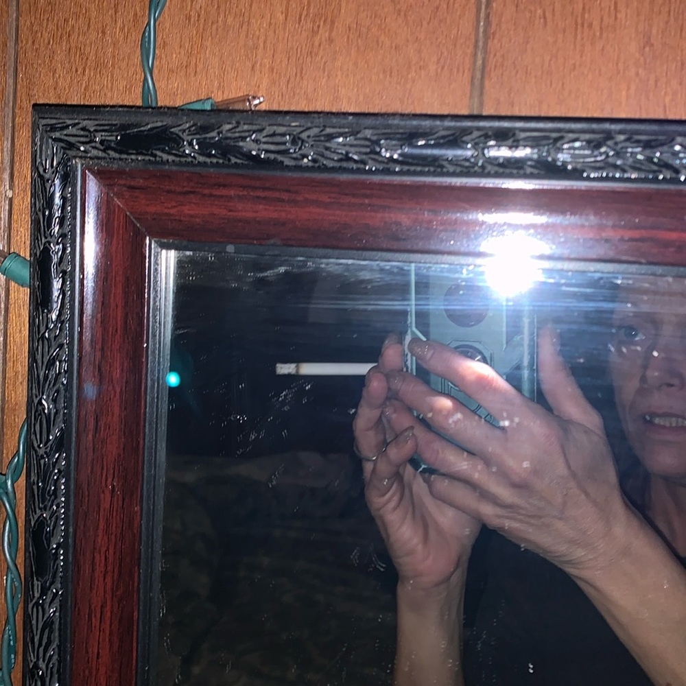 This is a vintage mirror weighs about 10 pounds